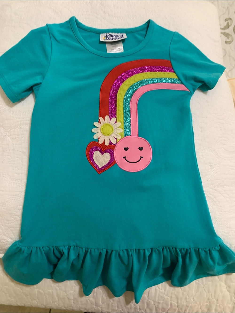 Counting Daisies Girl Dress with rainbow embroidery.